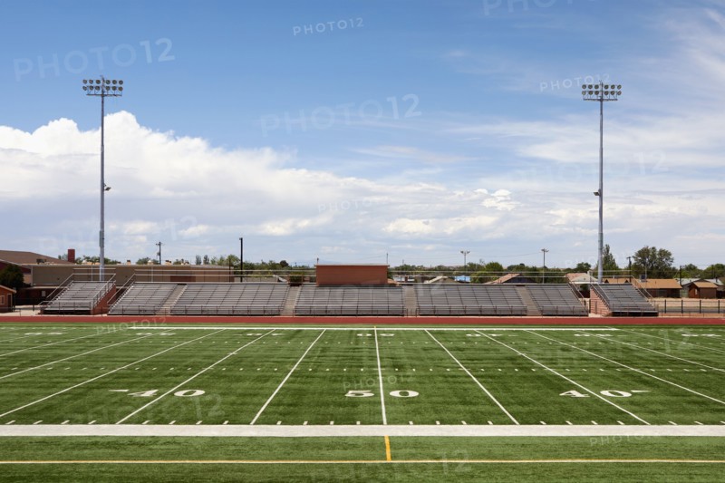Empty football field and bleachers, Winslow, Arizona, USA