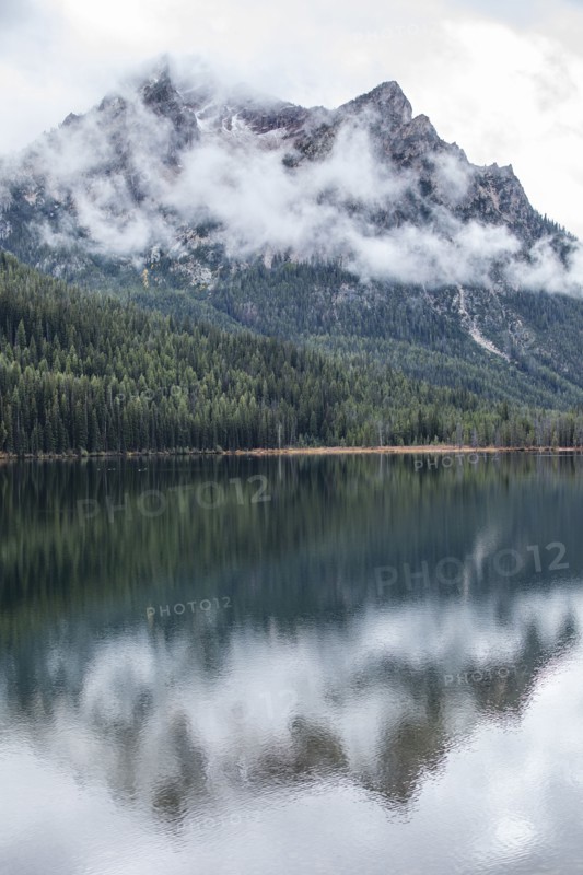 USA, Idaho, Clouds covering Sawtooth Mountains at Stanley Lake, Stanley, Idaho, USA