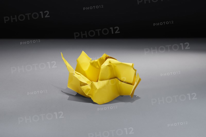 Studio shot of yellow crumpled paper, Austin, Texas, USA