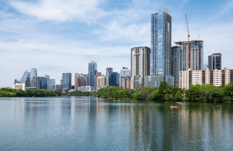 USA, Texas, Austin, Downtown buildings seen across river, Austin, Texas, USA