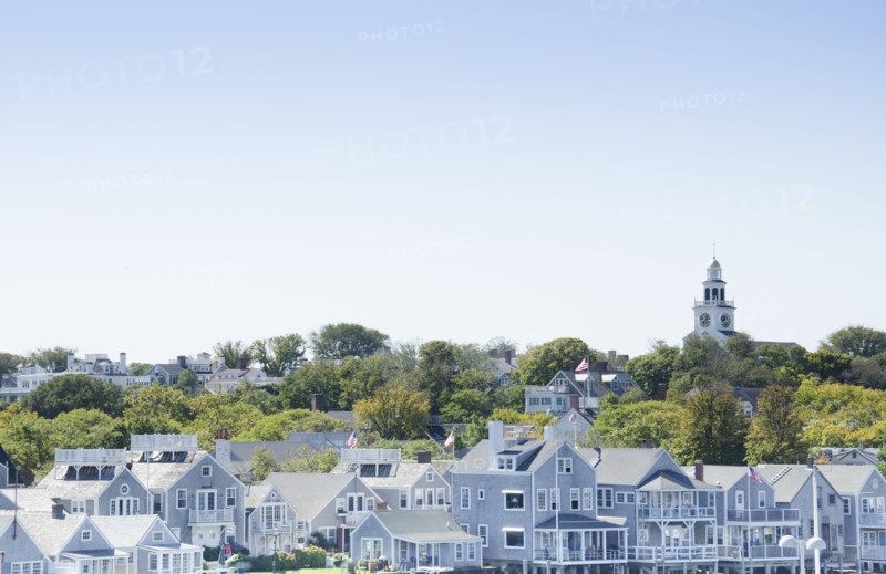 USA, Massachusetts, Blue houses and tree on Nantucket Island, Nantucket, Massachusetts, USA