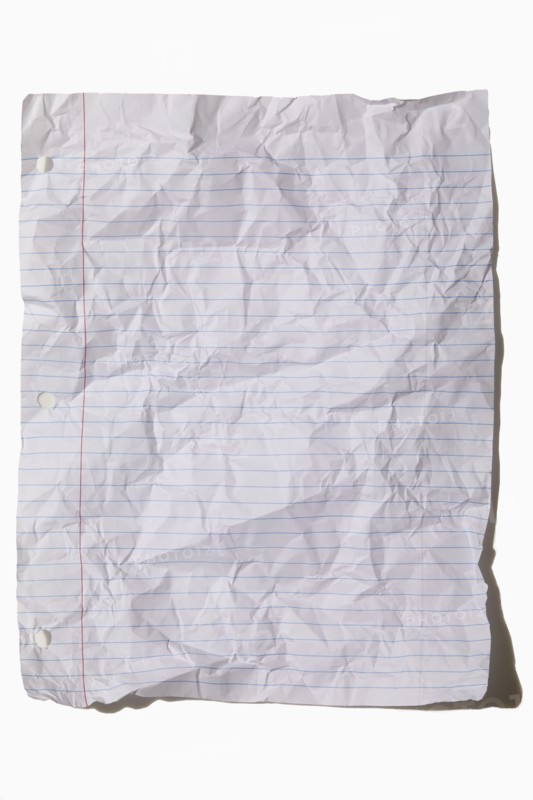 USA, New York State, New York City, Crumpled lined paper on white background, New York City, New York, USA