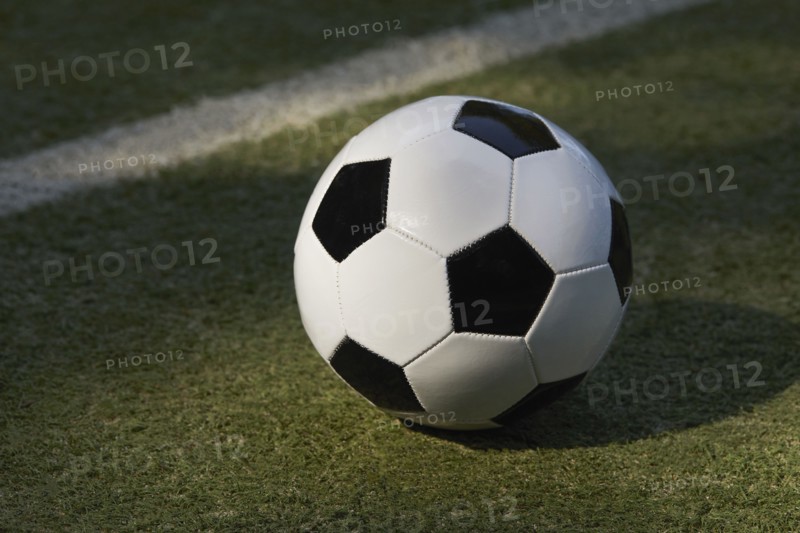 USA, New York State, New York City, Soccer ball on turf field, New York City, New York, USA