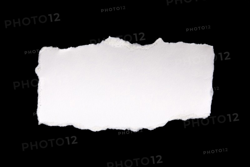 Torn peace of paper on black background, New York City, New York, USA
