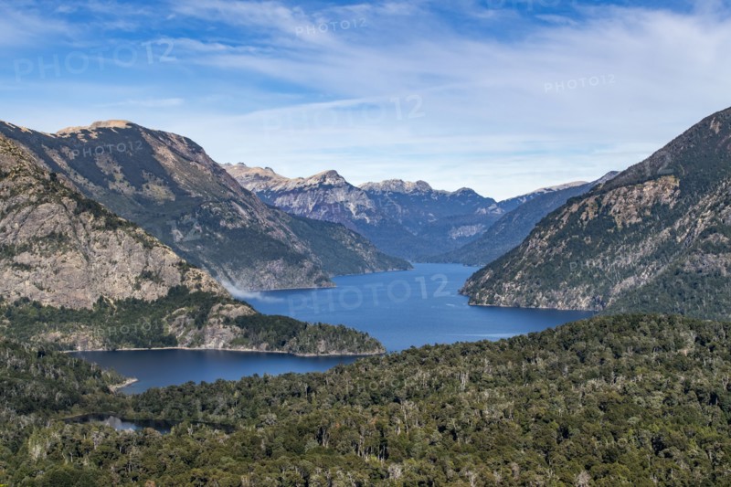 Wispy clouds above high mountain lake, Bariloche, , Argentina