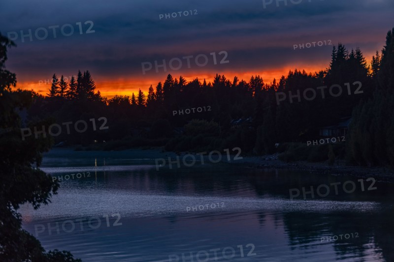 Calm lake and forest at sunrise, Bariloche, , Argentina