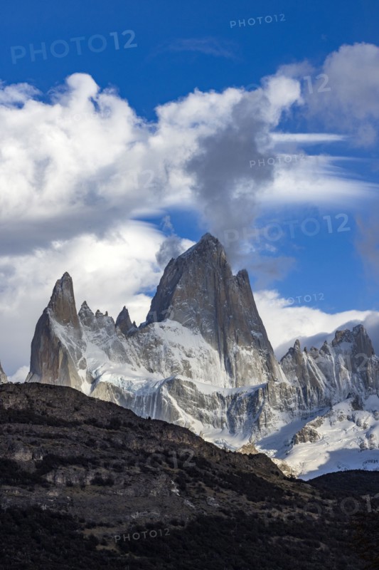Argentina, Santa Cruz, El Chalten, Clouds above snow covered Mount Fitz Roy, El Chalten, Santa Cruz, Argentina