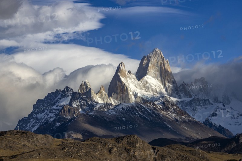Argentina, Santa Cruz, El Chalten, Clouds above snow covered Mount Fitz Roy, El Chalten, Santa Cruz, Argentina