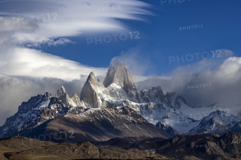 Argentina, Santa Cruz, El Chalten, Clouds above snow covered Mount Fitz Roy, El Chalten, Santa Cruz, Argentina