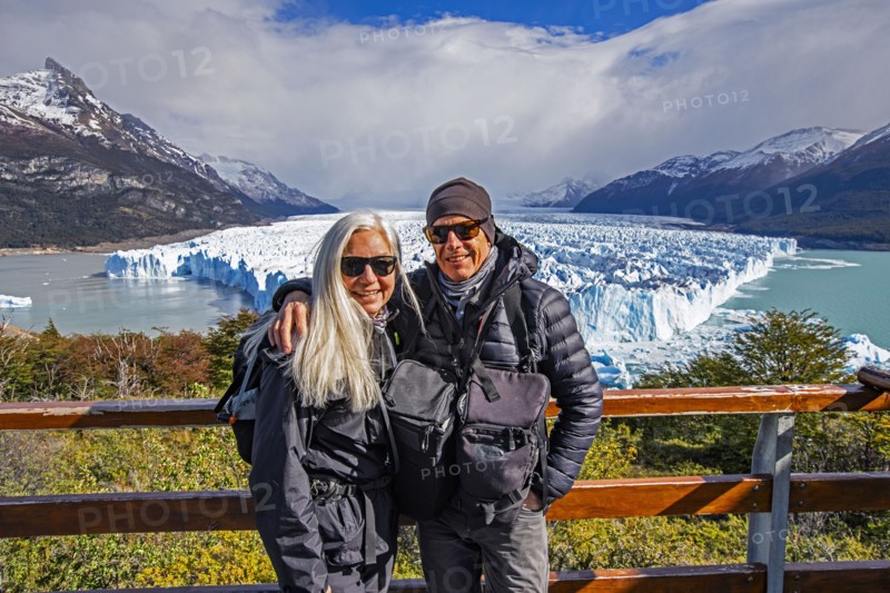 Argentina, Santa Cruz, El Calafate, Portrait of smiling couple at Perito Moreno Glacier, El Calafate, Santa Cruz, Argentina