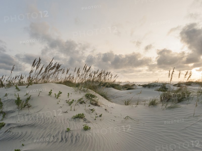USA, North Carolina, Nags Head, Sunrise above sandy beach and sea, Nags Head, North Carolina, USA