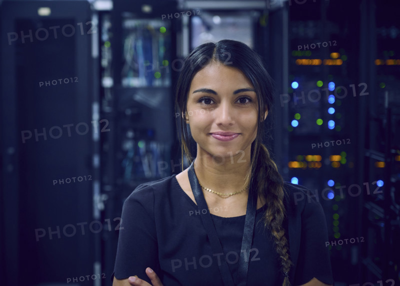 Portrait of smiling female technician in server room 
St, George, Utah, USA