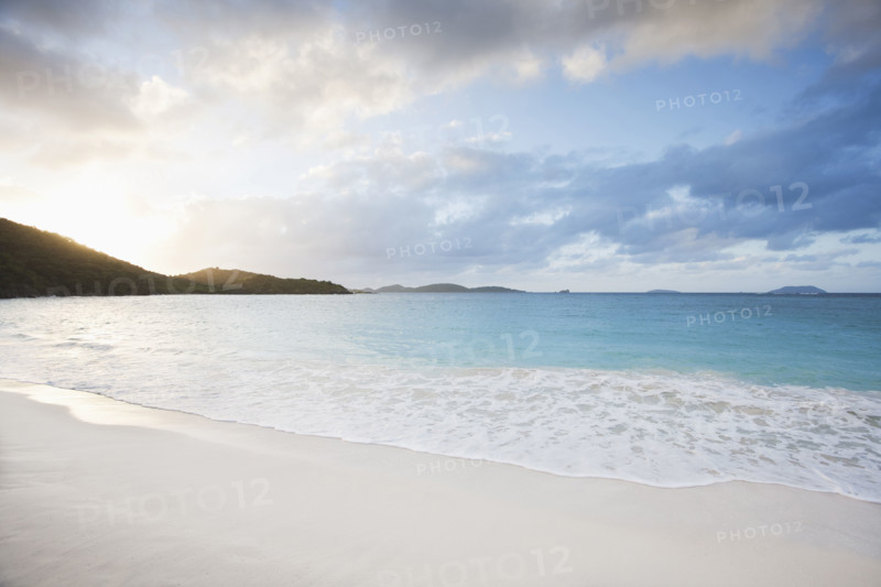 Sea waves on sandy beach and clouds at sunset
St. John, USA Virgin Islands, USA