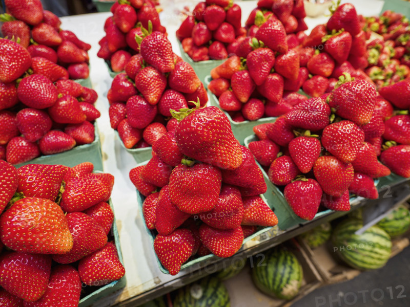 Close-up of ripe strawberries for sale on market stall
Vancouver, British Columbia, Canada