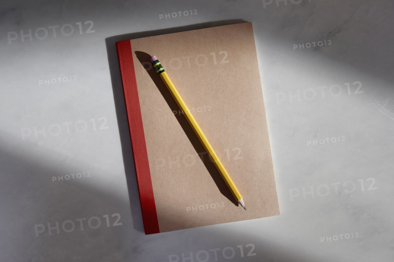 Notebook and pencil on marble surface
New York City, New York State, USA