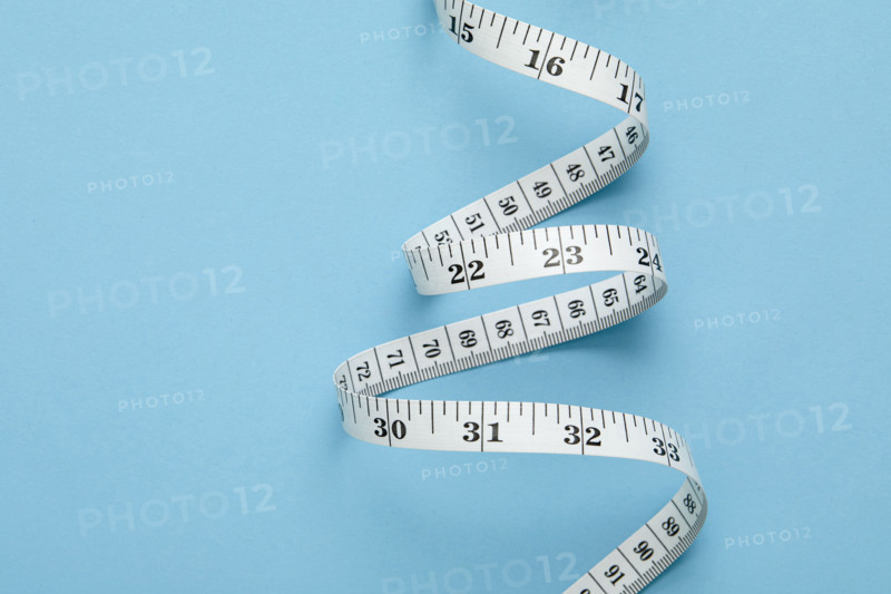 Measuring tape on blue background
New York City, New York State, USA