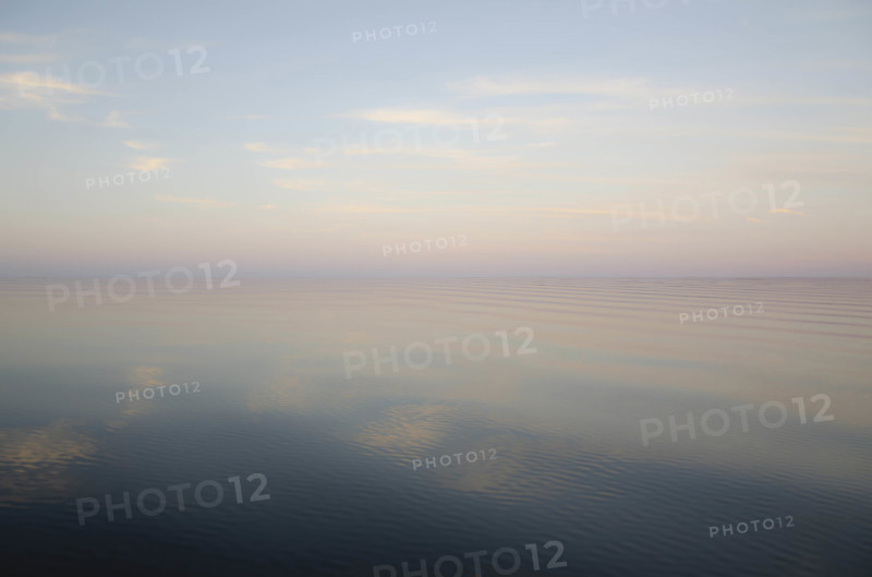 USA, New York, Hammond, Evening sky reflected in calm lake surface