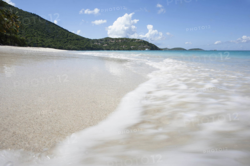 USA, United States Virgin Islands, St. John, Close-up of surf washing sandy beach