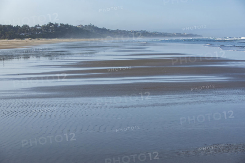 USA, Oregon, Newport, Empty wet Oregon beach