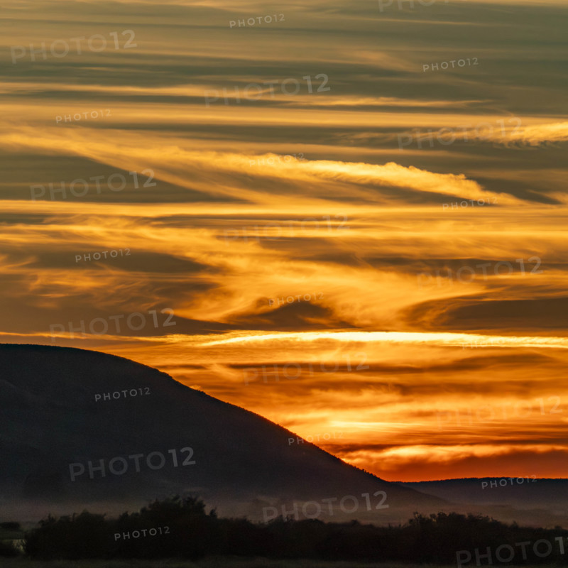 USA, Idaho, Bellevue, Silhouette of hill against sky at sunset