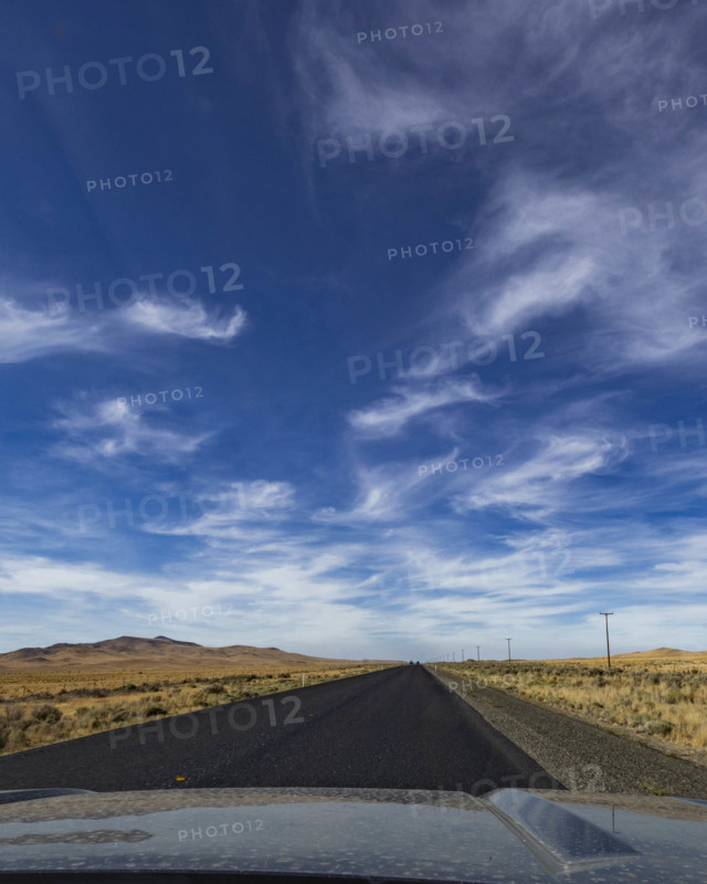 USA, Nevada, Winnemucca, Empty desert highway seen from car