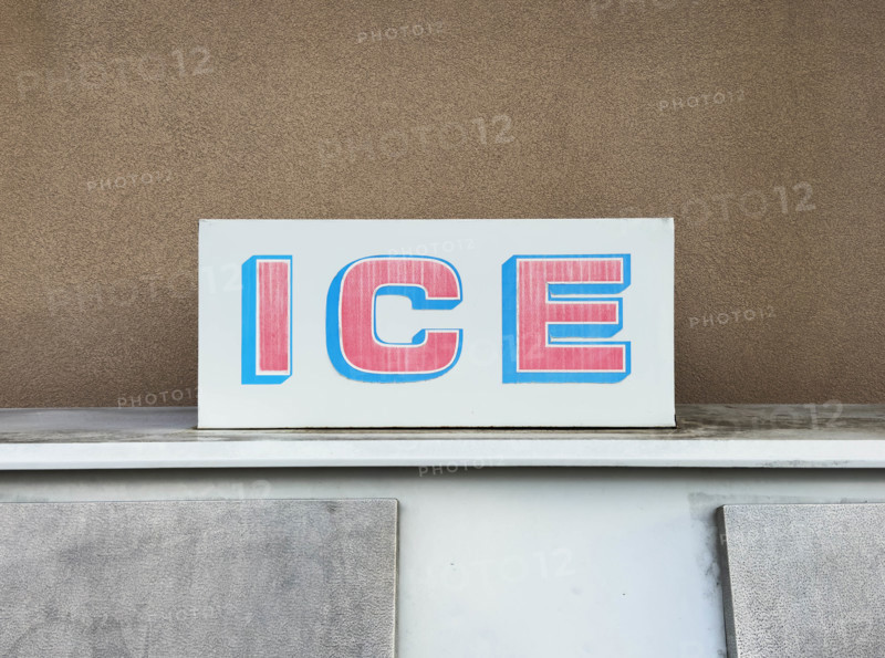 Close-up of ice machine outside convenience store