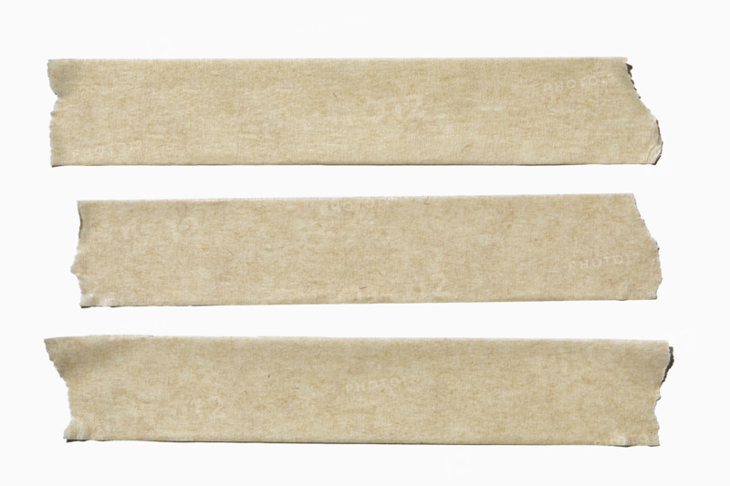 Three straps of masking tape on white background