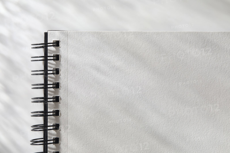 Close-up of open  spiral notebook