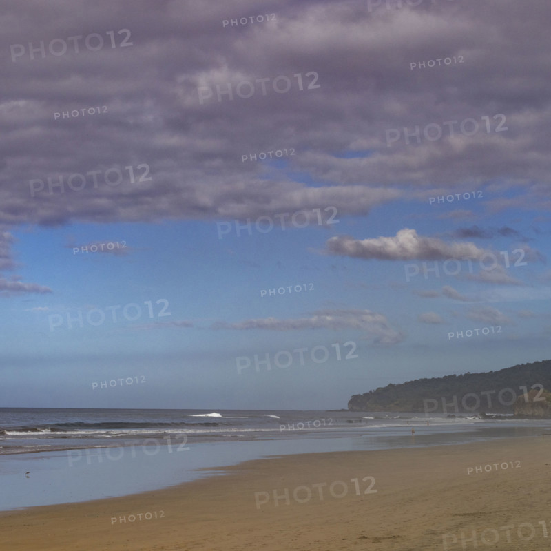 Costa Rica, Guanacaste, Playa Grande, Thick clouds over empty beach