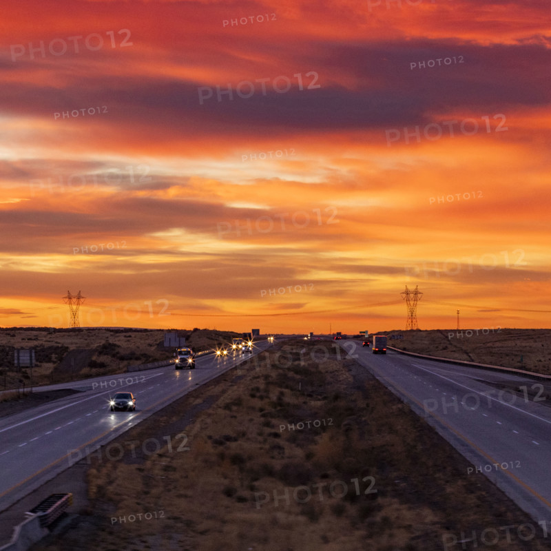 USA, Idaho, Boise, Dramatic sunrise sky above Interstate 84