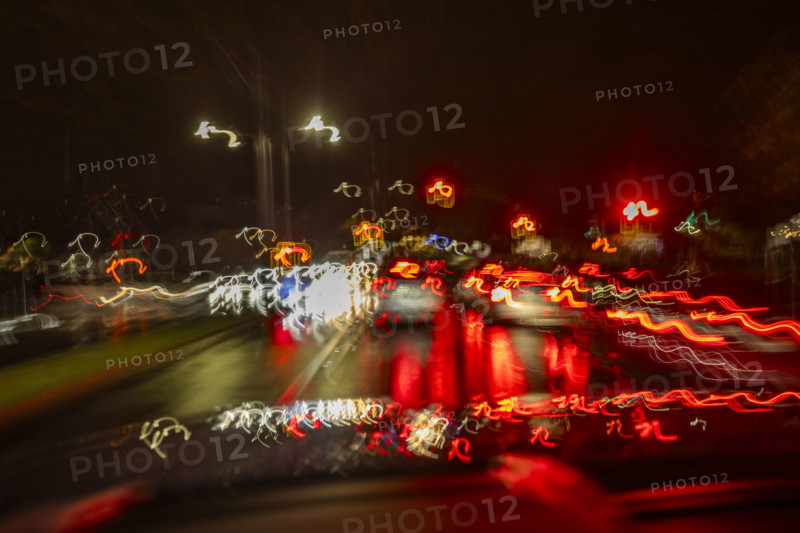 Motion blur night traffic in rain