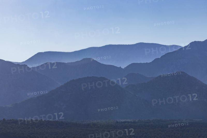 USA, Utah, LaVerkin, Silhouettes of mountain ranges against clear blue sky