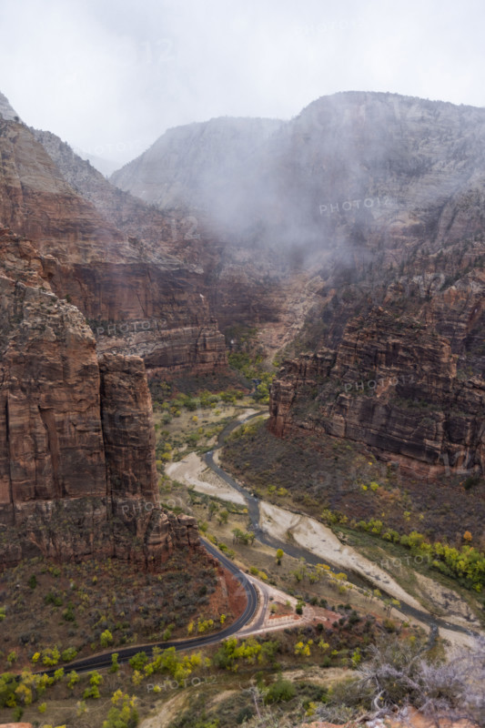 USA, Utah, Zion National Park, Cloud and fog above cliffs at Zion Canyon