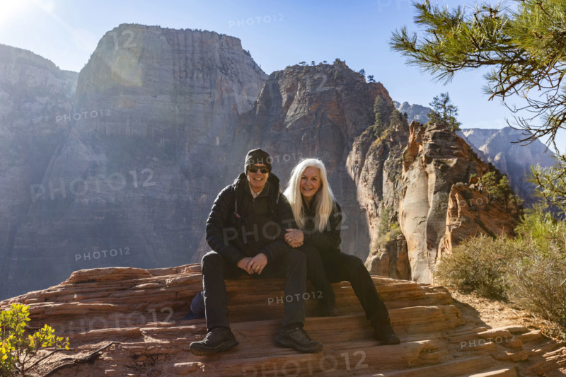USA, Utah, Zion National Park, Portrait of senior couple at Scouts Lookout below Angels Landing