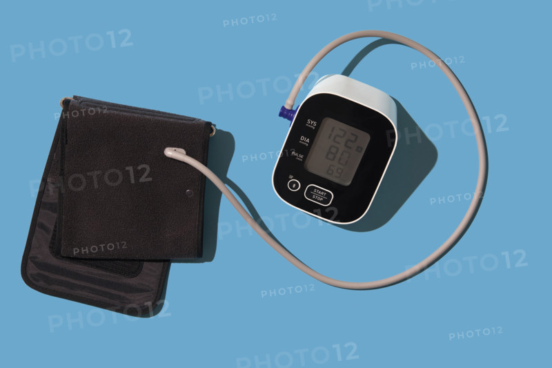 Blood pressure gauge on blue background