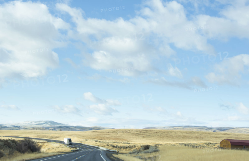 USA, Idaho, Single truck on highway in landscape