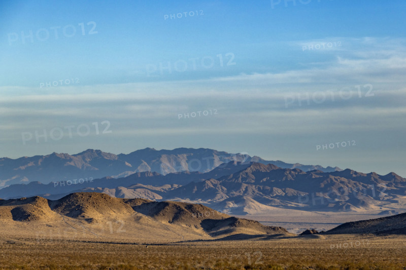 USA, California, Baker, Desert landscape with rocky mountain