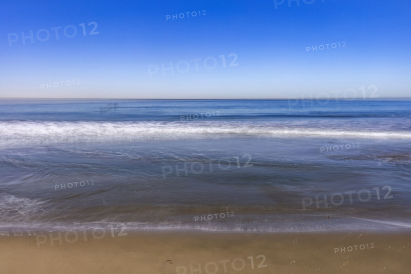 USA, California, Santa Monica, Calm ocean waves on empty Santa Monica Beach