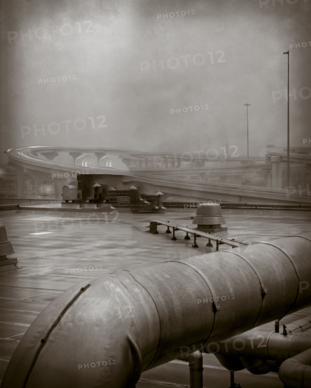 Dystopian view of industrial rooftop, black and white. Dallas, Texas, USA.