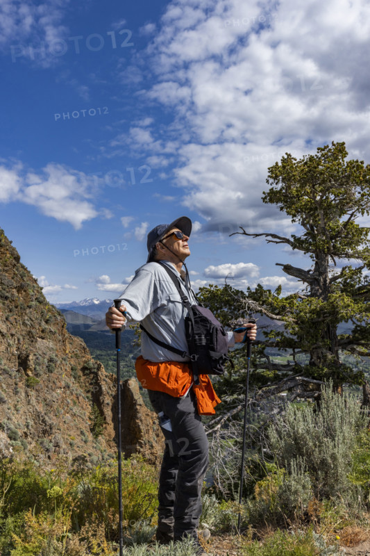 Man standing on Carbonate Mountain trail. Hailey, Idaho, USA.