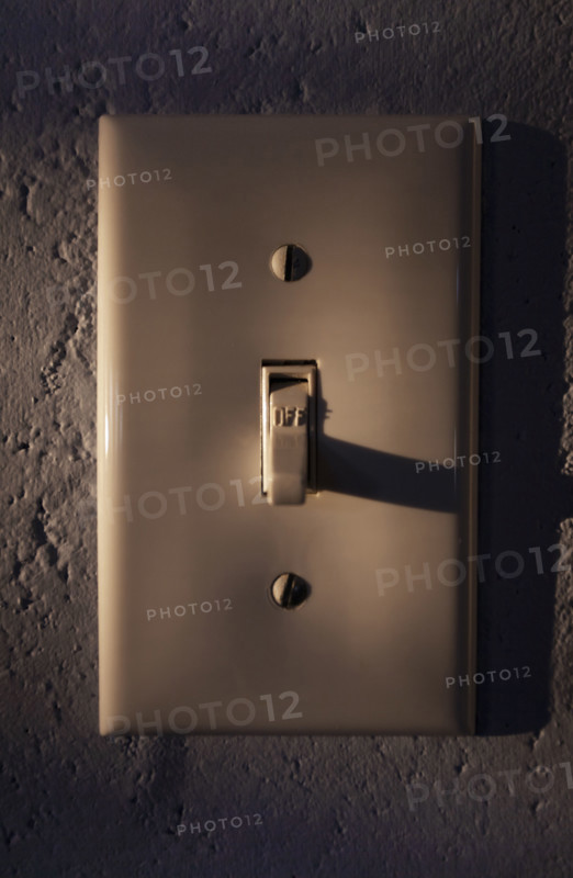 Close-up of light switch in off position. Nantucket, Massachusetts, USA.