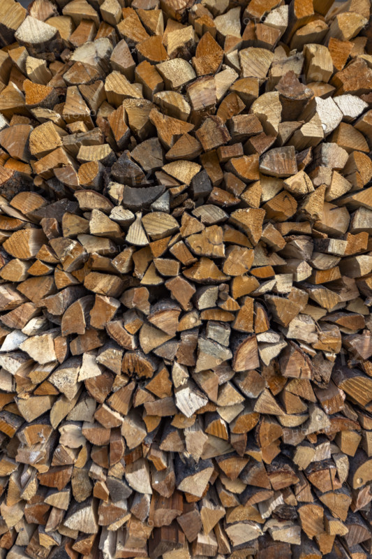 Close-up of firewood stacked for winter. Bellevue, Idaho, USA.