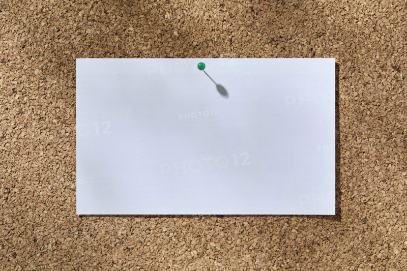 Blank white notecard on corkboard. New York City, New York State, USA.