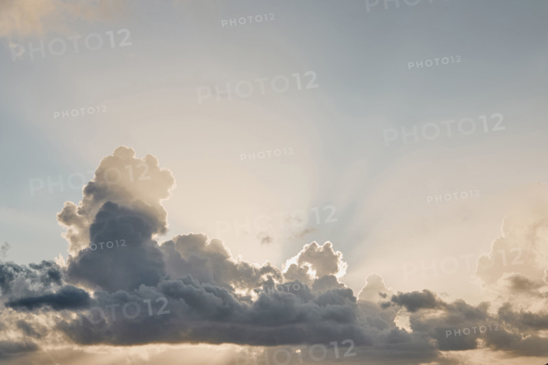 Puffy Cumulus clouds at sunrise. New York City, New York State, USA.