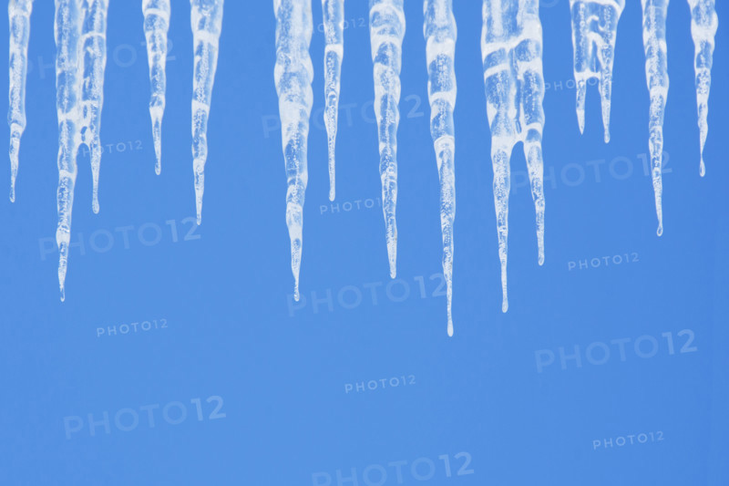 Icicles against clear blue sky. Nashville, Tennessee, USA.