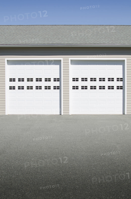 Closed garage doors on sunny day. Mendham, New Jersey, USA.
