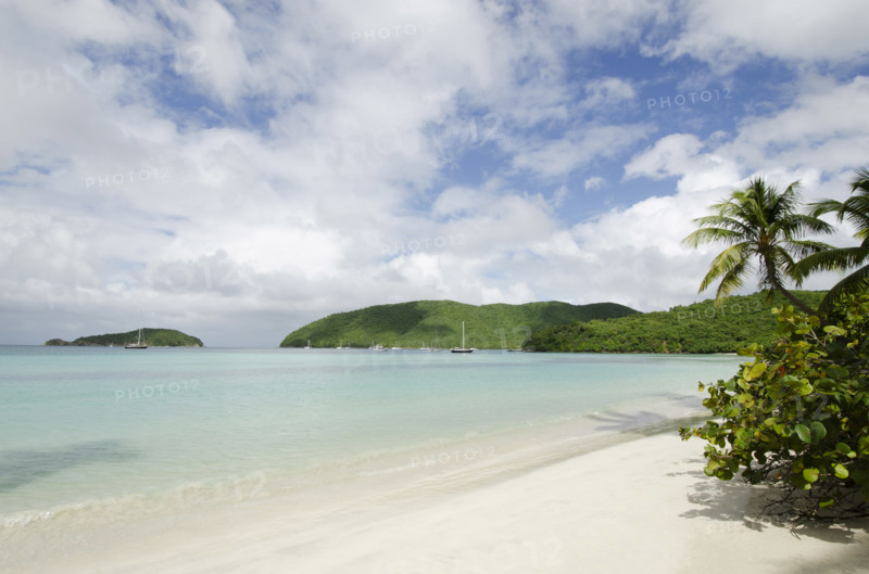 Calm sea and empty Maho Bay beach, St. John, United States Virgin Islands, USA.