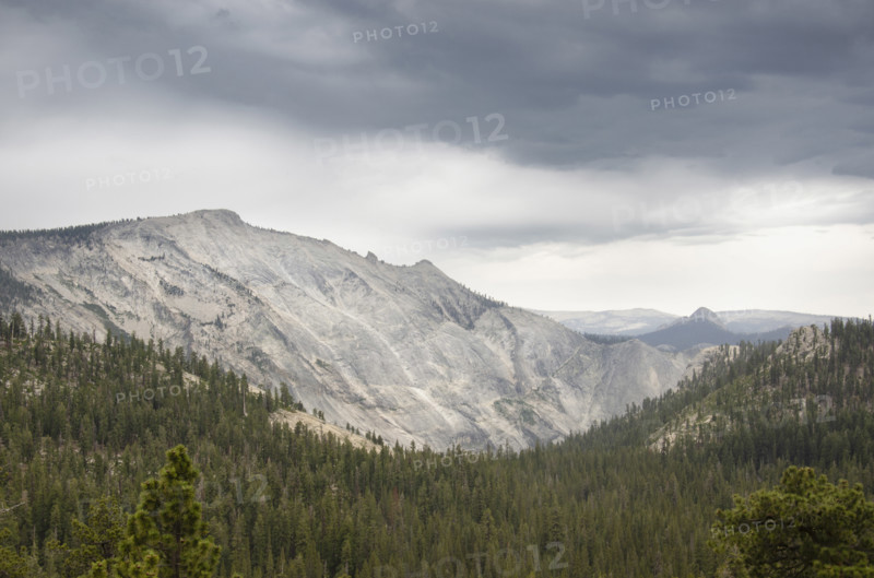 Storm clouds gathering over Yosemite National Park, Tuolumne Meadows, California, USA.
