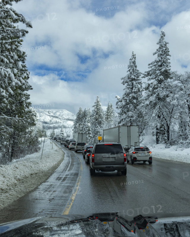 Traffic on highway in Winter seen from car, Truckee, California, USA.