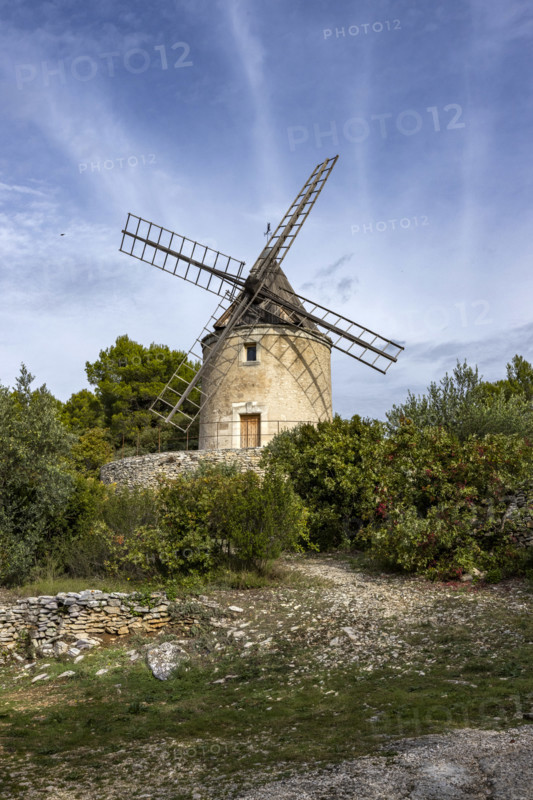 Antique windmill in rural landscape, Gordes, Vaucluse, France.
